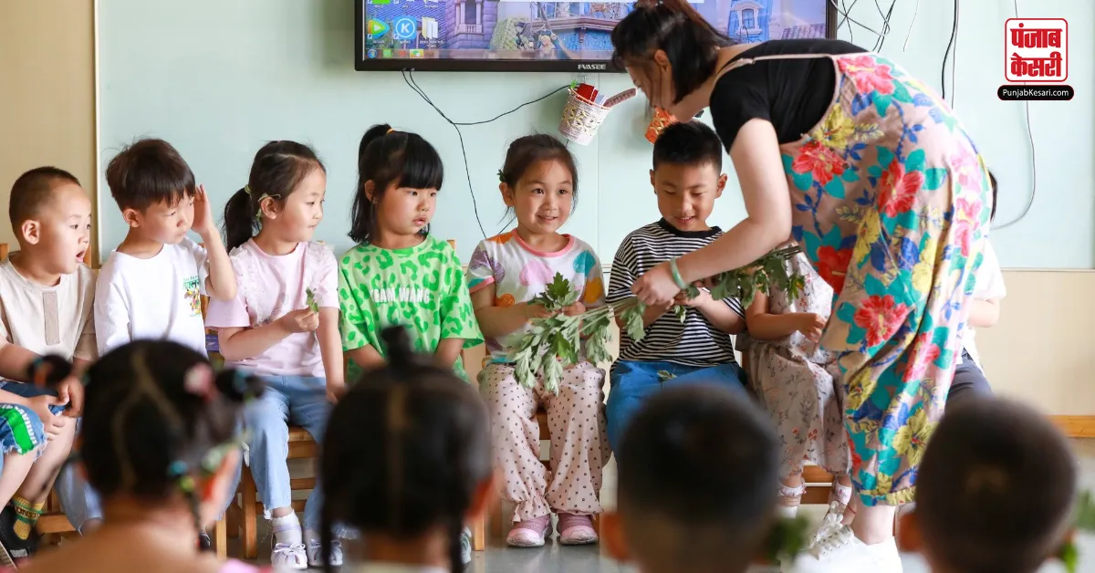 kindergarten boy gives girl golden biscuit