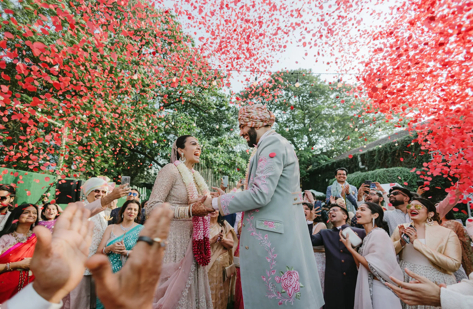 guwahati groom touches bride feet in wedding