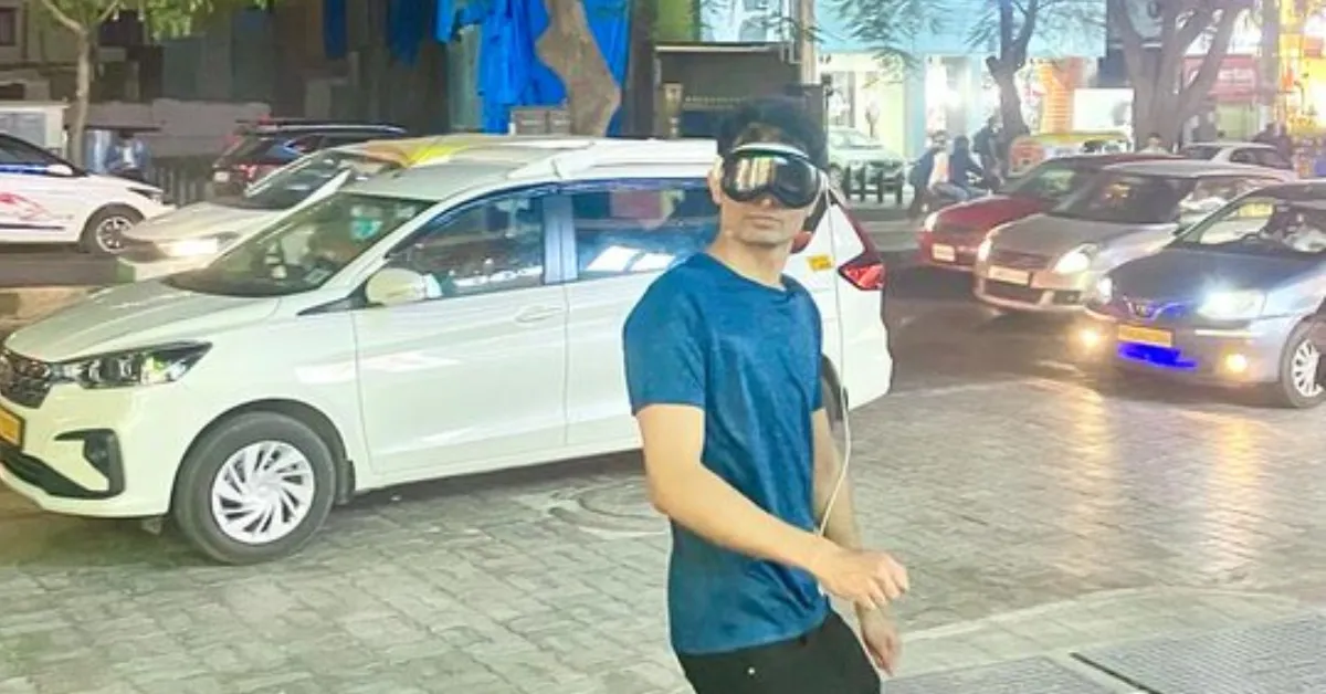 man using apple vision pro on streets of bengaluru