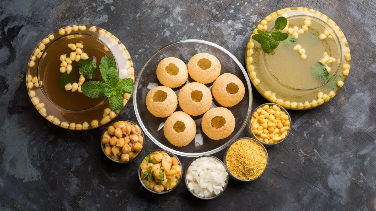 Gold And Silver Panipuri Served With Dry fruit 