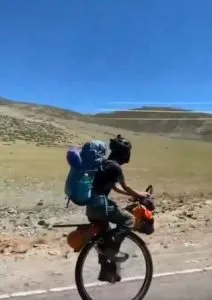 Man driving unique cycle